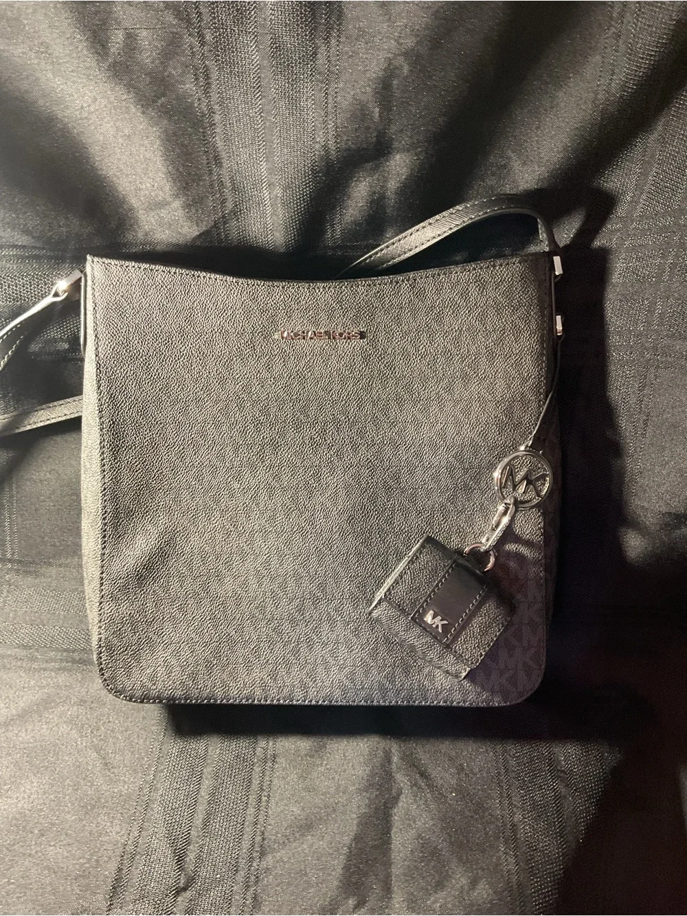 Michael Kors Black Pebbled Crossbody Bag with MK Charm and matching AirPod case